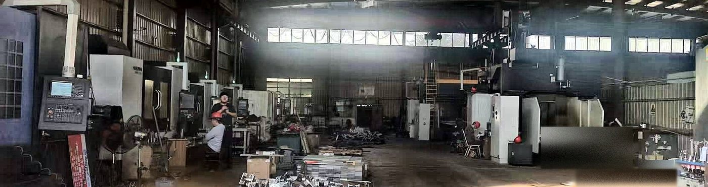 The machining workshop, with vertical machining centers on the left and a gantry machining center on the right