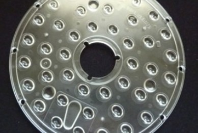 A clear COP lens plate for LED lighting