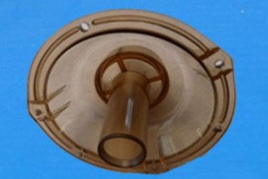 An amber PES part for milking equipment